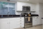 Large open kitchen w/ granite counters and stainless appliances